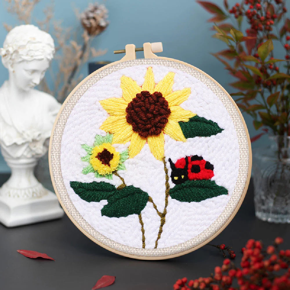 Punch Needle-bloemen en lieveheersbeestje
