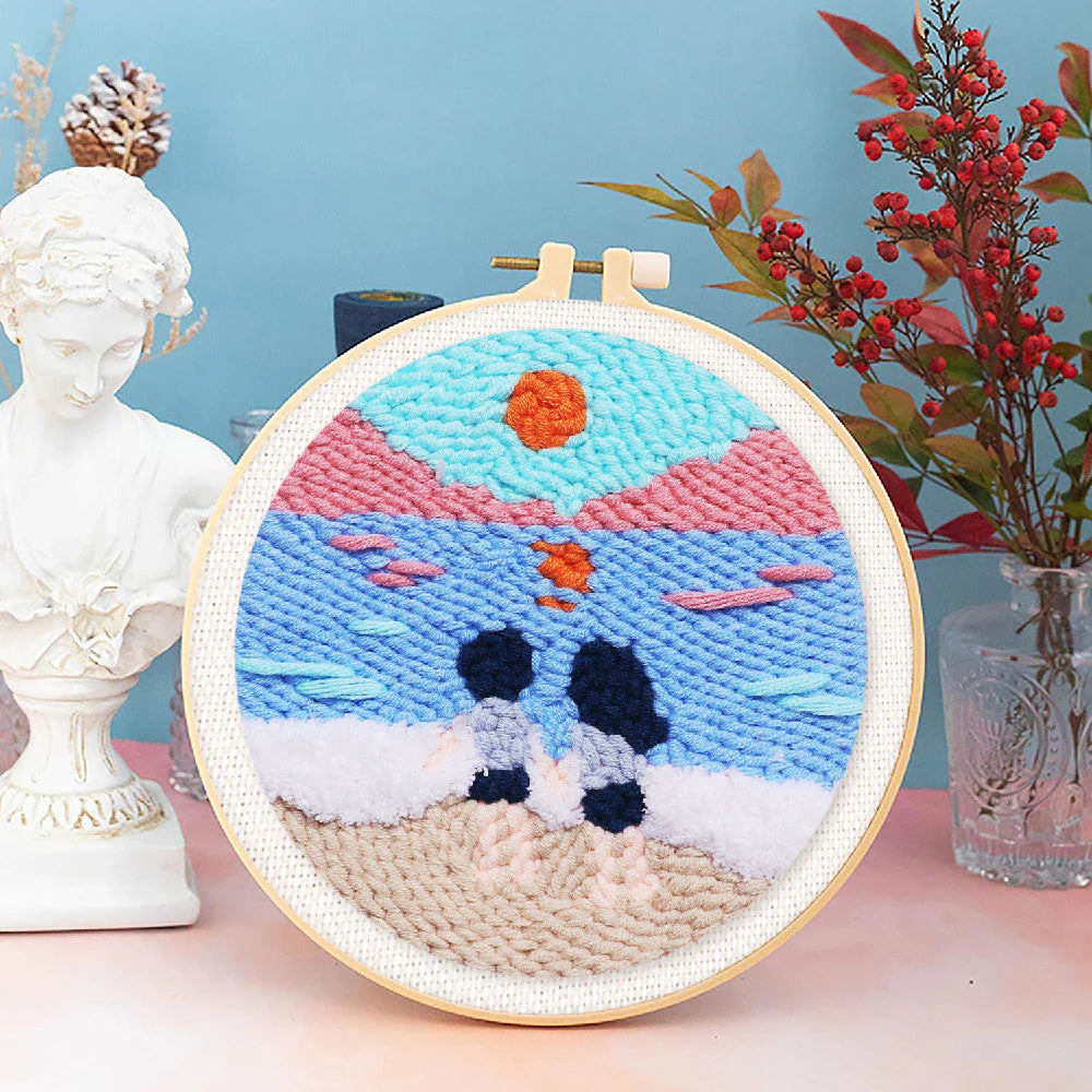 Punchnaald op het strand