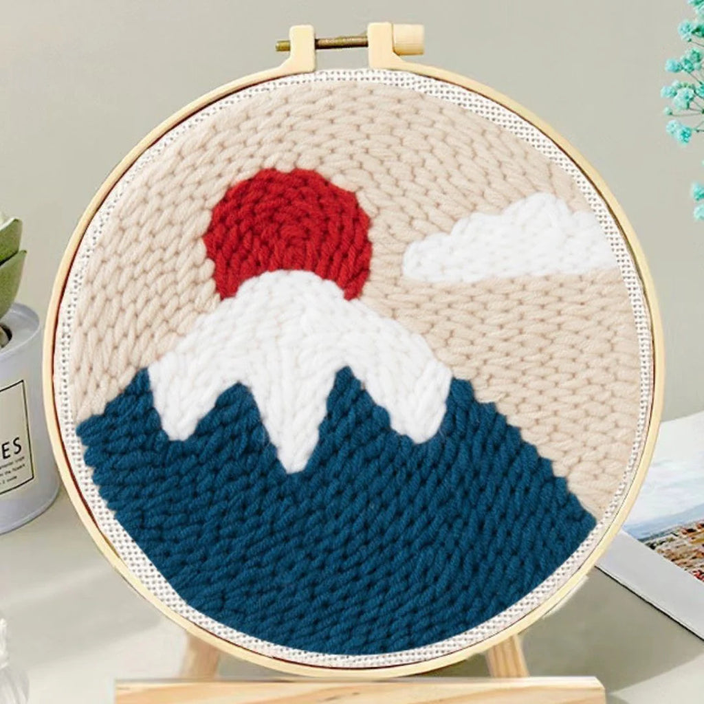 Punch Naald Besneeuwde top en rode pompon