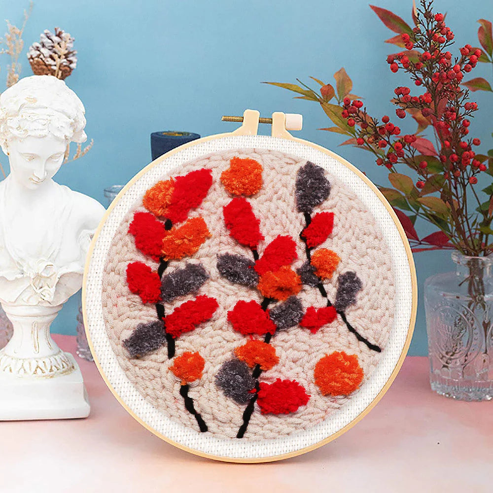 Punch Naald Gekleurde takken op een beige achtergrond