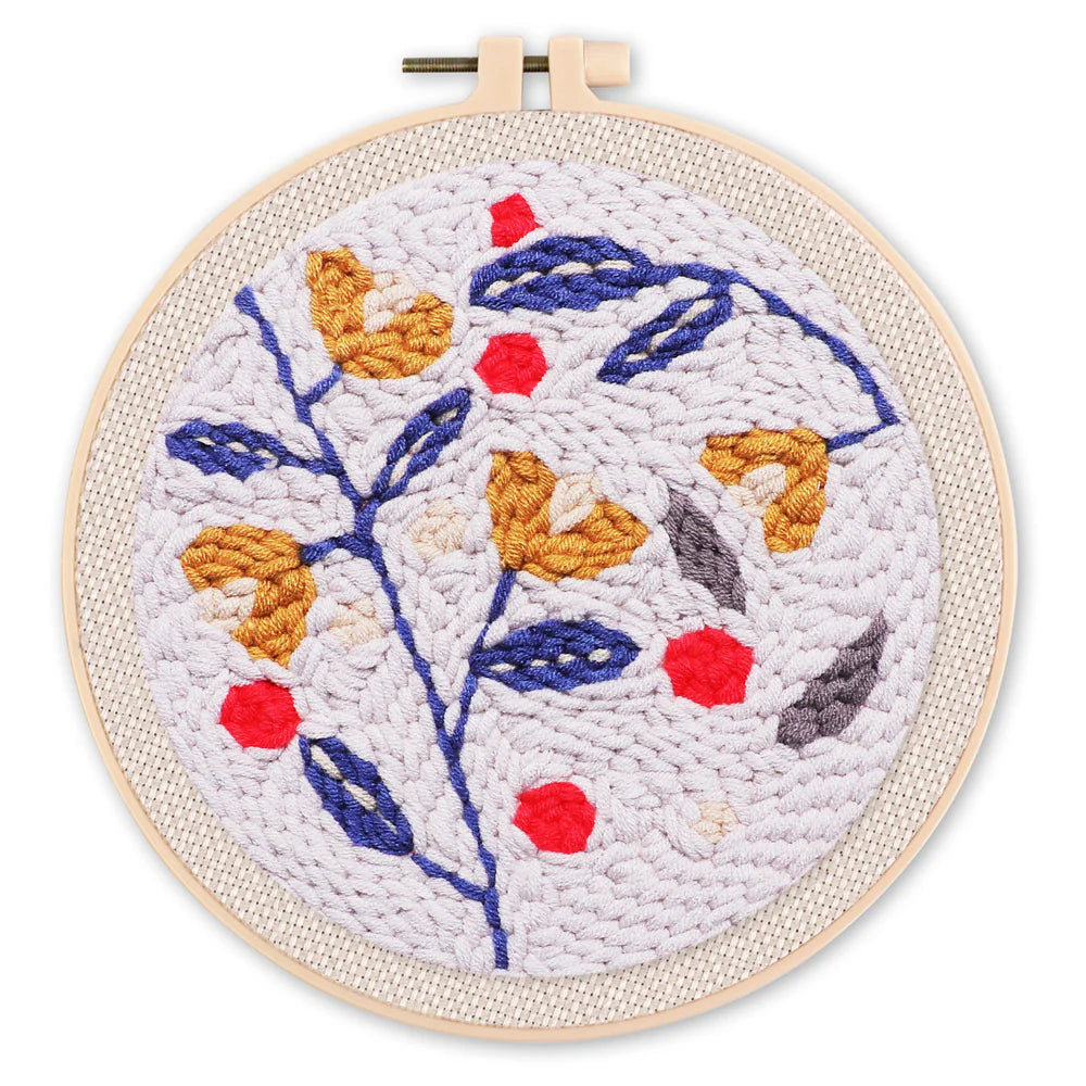 Punch Naald Hulst op blauwe achtergrond